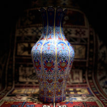 8 Chinese Porcelain hand-painted cloisonné vases including shipping.