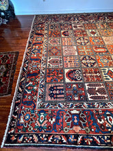 1940 PERSIAN BAKHTIARI RUG 10’ 4” x 12’ 8” (LAR.FEA.1482)