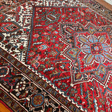 1950 PERSIAN HERIZ RUG 8’ 2” x 10’ 7” (FEA.LAR.743)