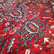 1950 PERSIAN HERIZ RUG 8’ 2” x 10’ 7” (FEA.LAR.743)