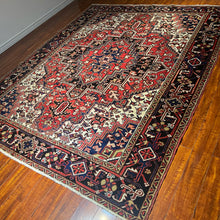 1950 PERSIAN HERIZ RUG 7’ 5” x 9’ 1” (LARG.61)