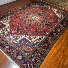 1950 PERSIAN HERIZ RUG 6’ 11” x 10’ 2” (LARG.FEA.60)