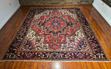 1950 PERSIAN HERIZ RUG 7’ 5” x 9’ 1” (LARG.61)