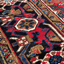 1950 PERSIAN HERIZ RUG 6’ 11” x 10’ 2” (LARG.FEA.60)