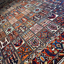 1940 PERSIAN BAKHTIARI RUG 10’ 4” x 12’ 8” (LAR.FEA.1482)