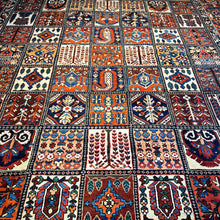 1940 PERSIAN BAKHTIARI RUG 10’ 4” x 12’ 8” (LAR.FEA.1482)