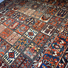 1940 PERSIAN BAKHTIARI RUG 10’ 4” x 12’ 8” (LAR.FEA.1482)