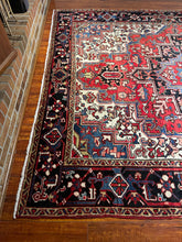 1950 PERSIAN HERIZ RUG 7’ 1” x 9’ (LARG.62)