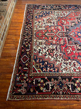 1950 PERSIAN HERIZ RUG 7’ 5” x 9’ 1” (LARG.61)