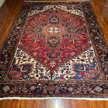 1950 PERSIAN HERIZ RUG 6’ 11” x 10’ 2” (LARG.FEA.60)