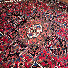 1950 PERSIAN HERIZ RUG 6’ 11” x 10’ 2” (LARG.FEA.60)