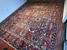 1940 PERSIAN BAKHTIARI RUG 10’ 4” x 12’ 8” (LAR.FEA.1482)