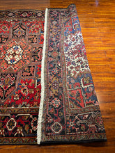 1950 PERSIAN HERIZ RUG 6’ 11” x 10’ 2” (LARG.FEA.60)