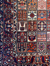 1940 PERSIAN BAKHTIARI RUG 10’ 4” x 12’ 8” (LAR.FEA.1482)