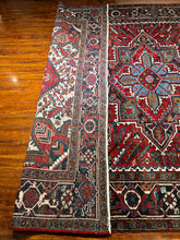 1950 PERSIAN HERIZ RUG 8’ 2” x 10’ 7” (FEA.LAR.743)