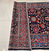 1950 NANAJ RUG 5’ 4” x 7’ (MED.FEA.4751)