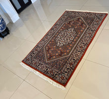 1970 BIDJAR RUG 2’ 9” x 4’ 8” (MED.FEA.#3277)