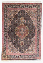 1970 TABRIZ RUG 3’ 3” x 4’ 8” (MED.FEA.310)