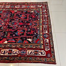 1977 NAHAVAND RUG 5’ x 8’ 11” (MED.FEA.304)