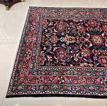 1950 NANAJ RUG 5’ 4” x 7’ (MED.FEA.4751)