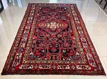 1977 NAHAVAND RUG 5’ x 8’ 11” (MED.FEA.304)