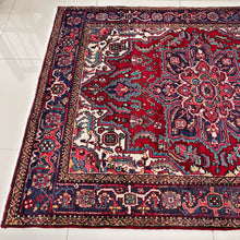 1940 HERIZ RUG 4’ 10” x 6’ (MED.FEA.365)