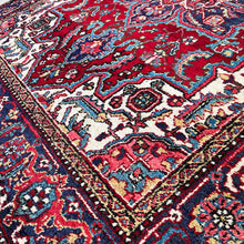 1940 HERIZ RUG 4’ 10” x 6’ (MED.FEA.365)