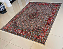 1970 PERSIAN MOOD RUG 5’ x 6’ 7” (MED.FEA.136)