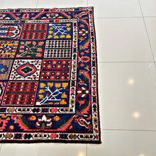 1930 BAKHTIARI RUG 5’ x 6’ 10” (MED.FEA.185)