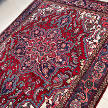 1940 HERIZ RUG 4’ 10” x 6’ (MED.FEA.365)