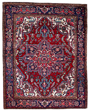 1940 HERIZ RUG 4’ 10” x 6’ (MED.FEA.365)