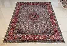 1970 PERSIAN MOOD RUG 5’ x 6’ 7” (MED.FEA.136)