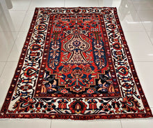 1940 BAKHTIARI RUG 4’ 5” x 6’ 8” (MED.FEA.245)